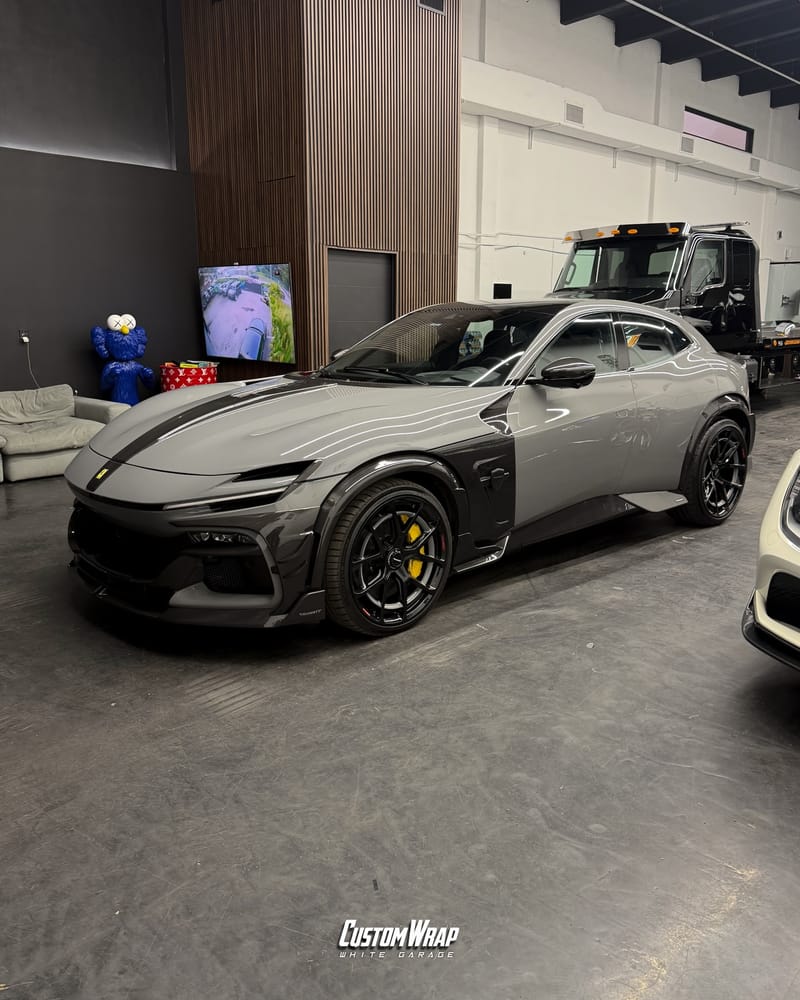 Ferrari Purosangue Mansory wrapped from red to Nardo Gray
