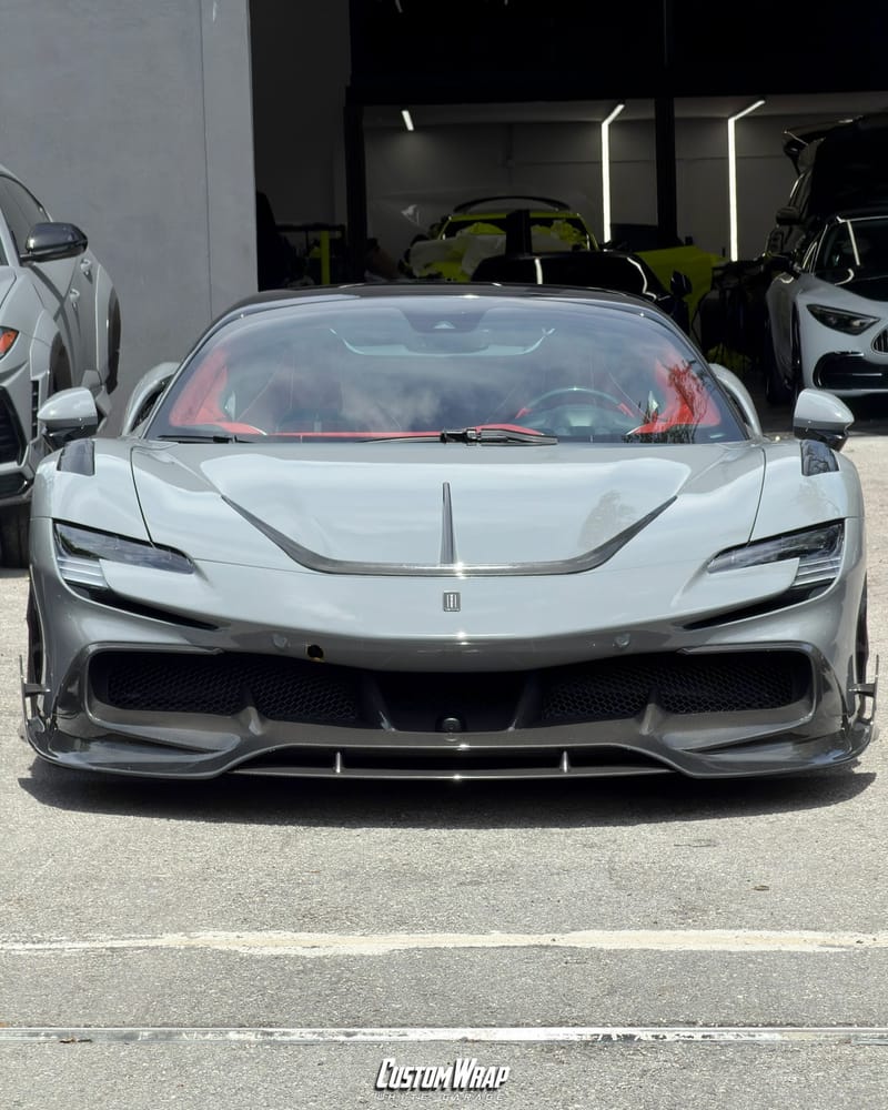 Ferrari SF90 Mansory wrapped in 3M High Gloss Nardo Gray, front view